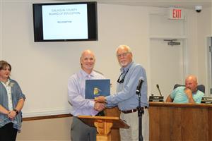 Ohatchee Principal Mr. Tittle with Mike Almaroad in recognition of being name as a Bicentennial School 